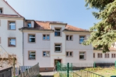 Hausansicht - Helle 2 Zimmerwohnung mit Tageslichtbad *Gartennutzung möglich*